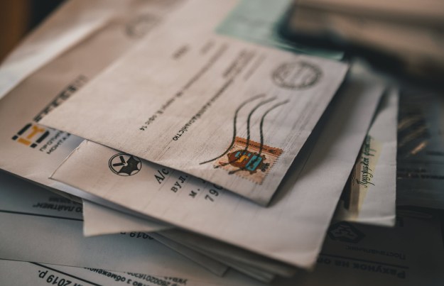 shalow focus photography of mailed letters